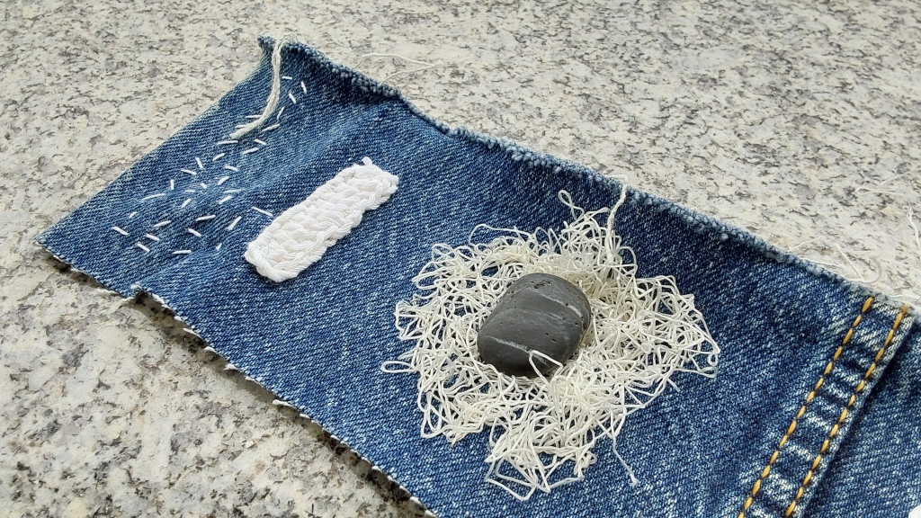 Free art project: slow stitching from Sketchbook revival where I used a piece of old jeans, the test crochet row, some thread from packaging and some natural material - nothing fancy but it looks nice in person and it was lovely creating this slow stitching roll.