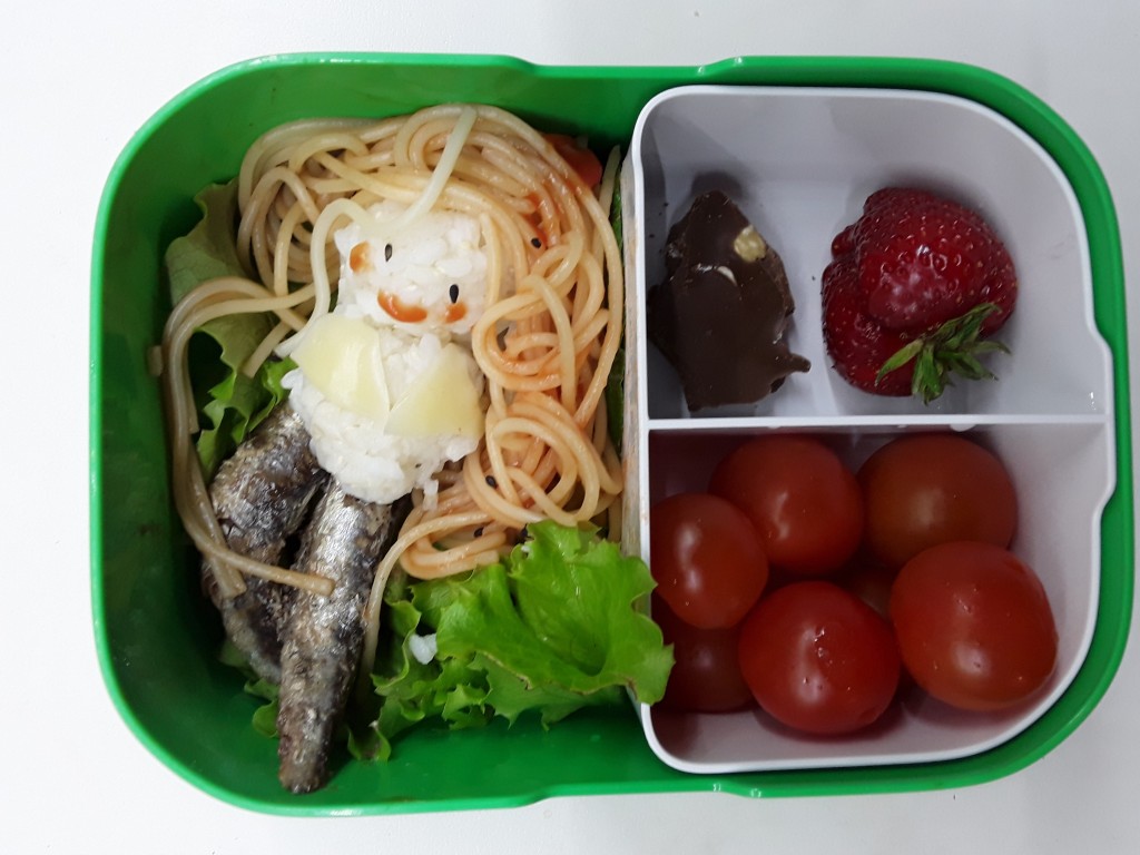 This mermaid-themed lunch covers all the categories: protein - fish (for the tail), rice (body) and noodles (pasta), veggies - lettuce and cherry tomatoes, fruits (strawberry), and dessert (a piece of chocolate). This was a lunch for a small child;).